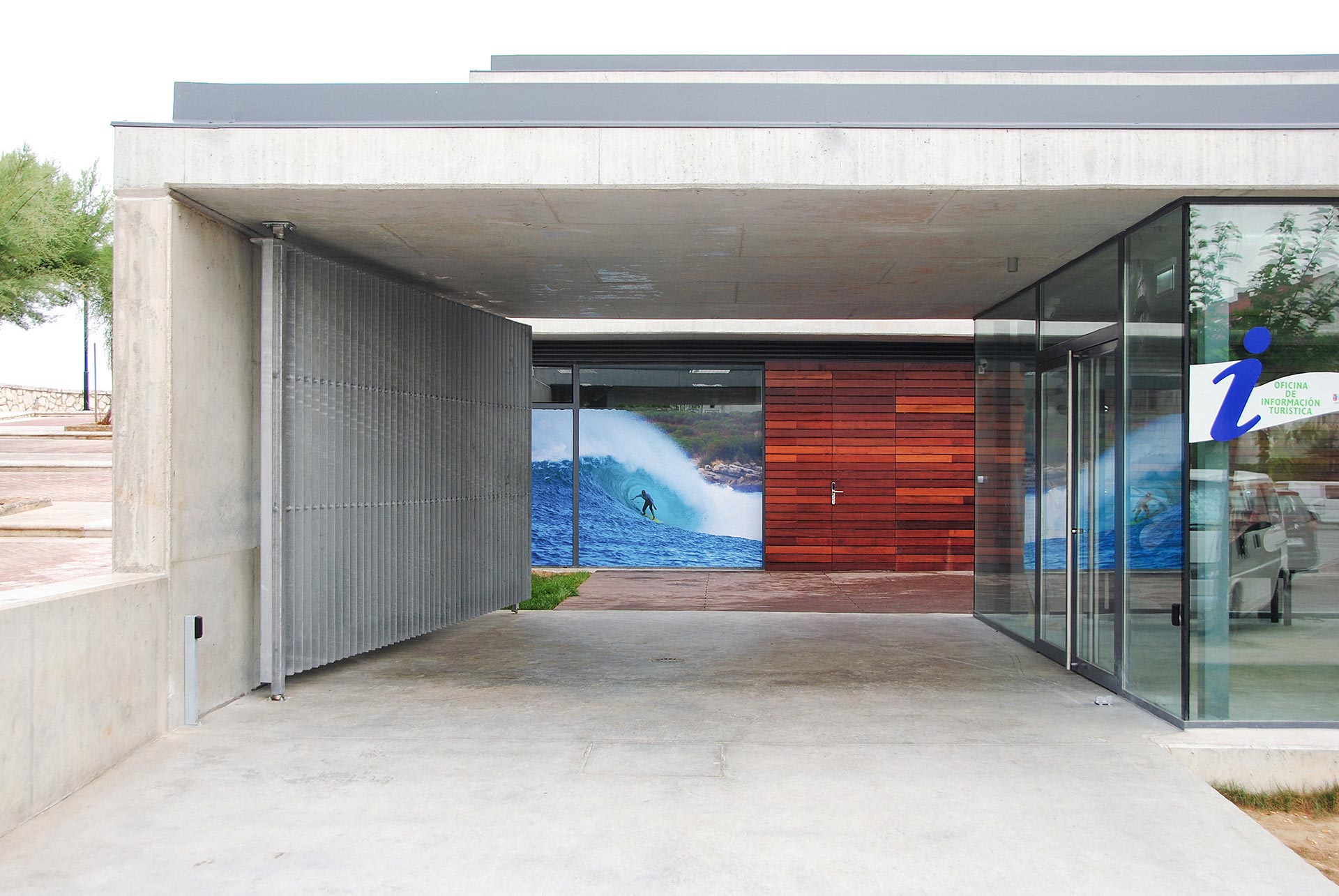 Main entrance with steel door of Surf Center designed by Moah Architects in Somo