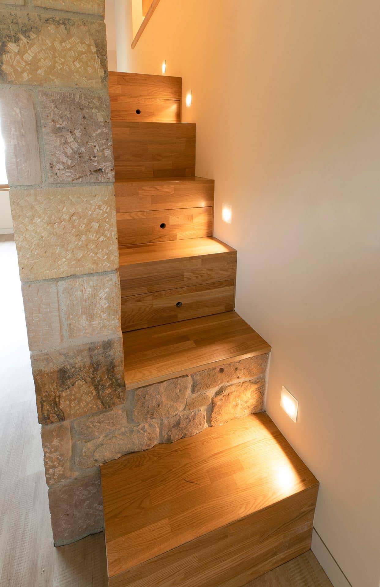 Wood and Stone stairs in passive cottage in Proaño designed by Moah Architects in Cantabria